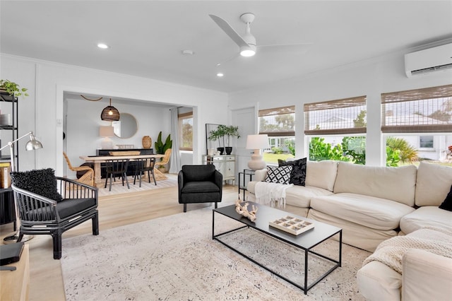404 Bayshore Rd, Nokomis, FL 34275 - living room featuring an AC wall unit, a ceiling fan, crown molding, and wood finished floors
