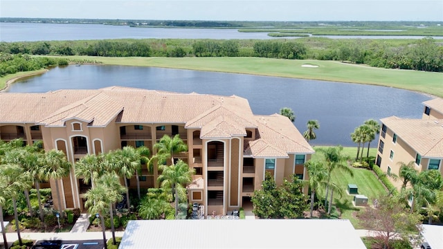 6515 Grand Estuary Trl Unit 208, Bradenton, FL 34212 - drone / aerial view of a large body of water and a golf club