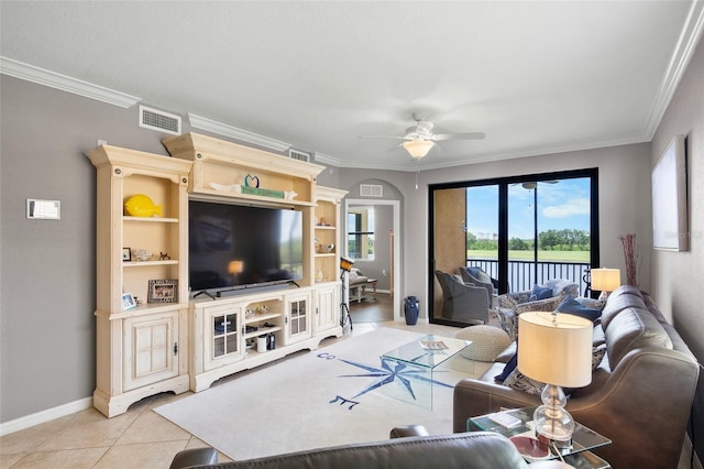 6515 Grand Estuary Trl Unit 208, Bradenton, FL 34212 - living room with baseboards, ornamental molding, light tile patterned floors, and ceiling fan