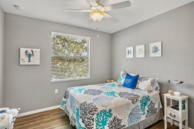 6515 Grand Estuary Trl Unit 208, Bradenton, FL 34212 - bedroom featuring wood finished floors, baseboards, and ceiling fan