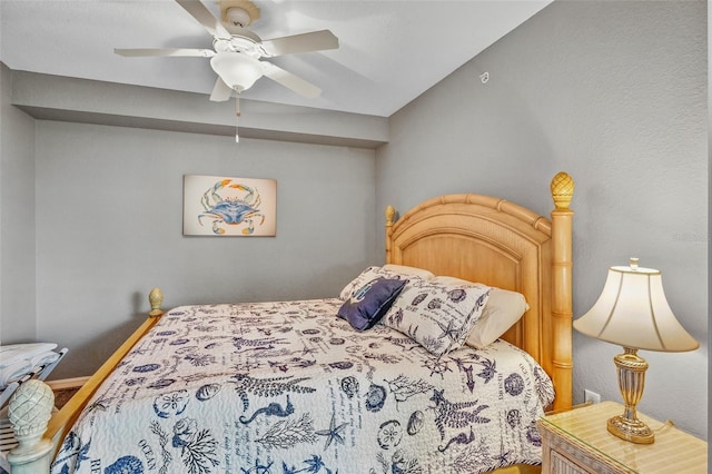 6515 Grand Estuary Trl Unit 208, Bradenton, FL 34212 - bedroom with wood finished floors, baseboards, and a ceiling fan