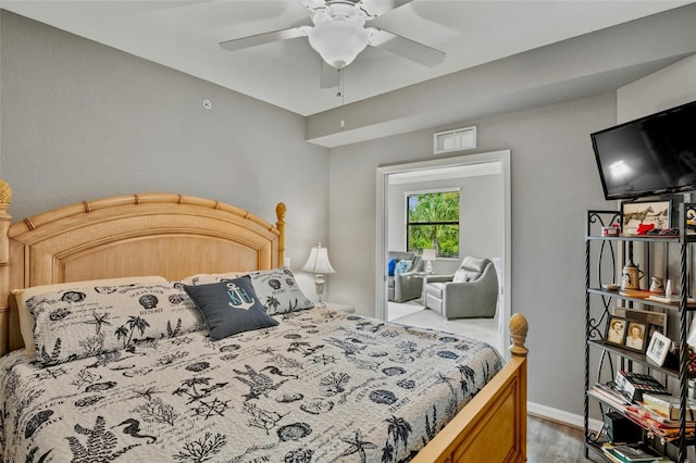 6515 Grand Estuary Trl Unit 208, Bradenton, FL 34212 - bedroom featuring wood finished floors, baseboards, and ceiling fan