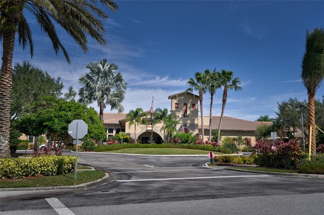 6515 Grand Estuary Trl Unit 208, Bradenton, FL 34212 - view of asphalt street featuring traffic signs and curbs