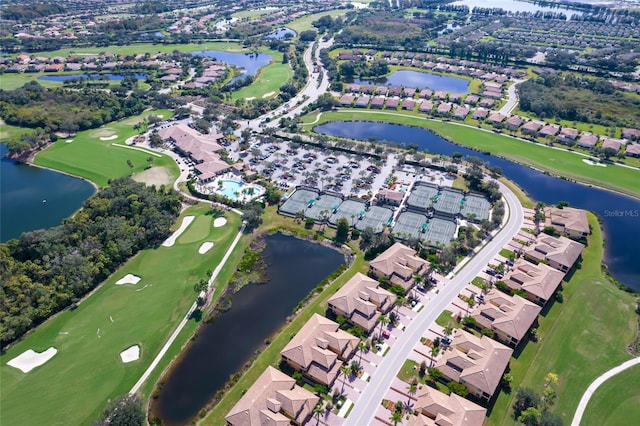 6515 Grand Estuary Trl Unit 208, Bradenton, FL 34212 - aerial view of property and surrounding area featuring a large body of water, a golf course, and nearby suburban area