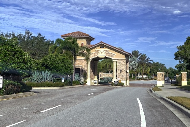 6515 Grand Estuary Trl Unit 208, Bradenton, FL 34212 - view of asphalt road featuring curbs