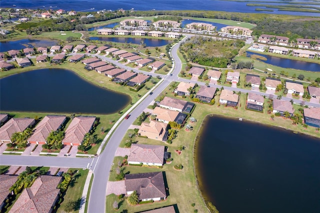 6515 Grand Estuary Trl Unit 208, Bradenton, FL 34212 - aerial overview of property's location featuring nearby suburban area and a large body of water