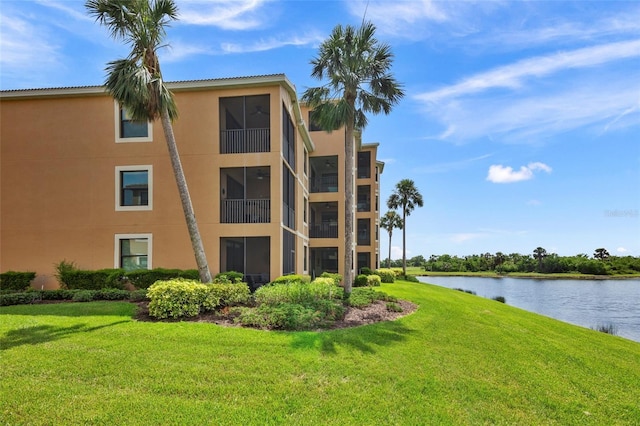 6515 Grand Estuary Trl Unit 208, Bradenton, FL 34212 - view of building exterior with a water view
