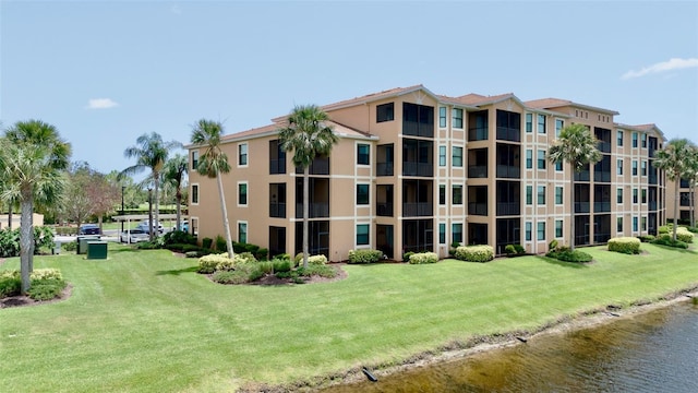 6515 Grand Estuary Trl Unit 208, Bradenton, FL 34212 - view of apartment building / complex with a water view
