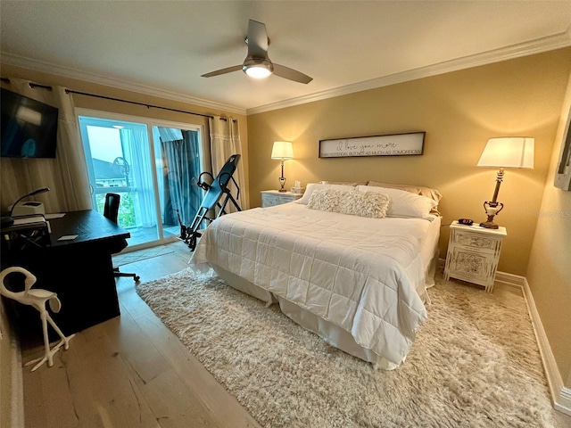 3272 Lake Bayshore Dr Unit 515, Bradenton, FL 34205 - bedroom featuring access to outside, hardwood / wood-style floors, ornamental molding, baseboards, and ceiling fan