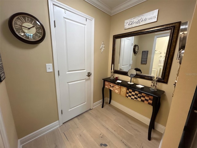 3272 Lake Bayshore Dr Unit 515, Bradenton, FL 34205 - hall with light wood-style floors, baseboards, and ornamental molding