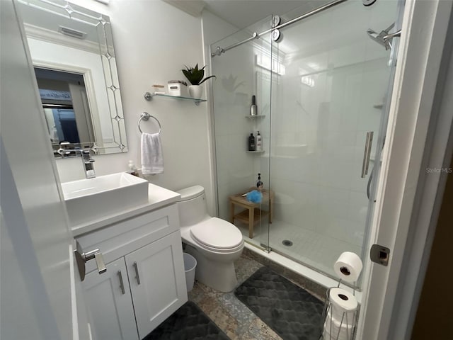 3272 Lake Bayshore Dr Unit 515, Bradenton, FL 34205 - full bathroom with toilet, a shower stall, and vanity