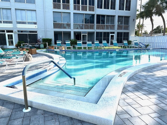 3272 Lake Bayshore Dr Unit 515, Bradenton, FL 34205 - community pool featuring a patio