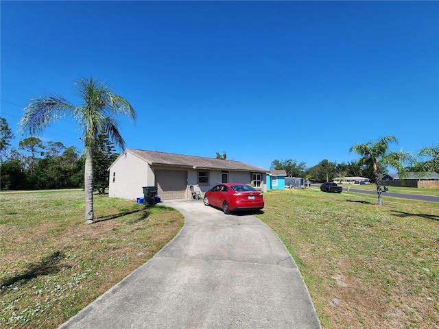 6405 Myrtlewood Rd, North Port, FL 34287 - ranch-style house featuring concrete driveway, a front yard, and a garage