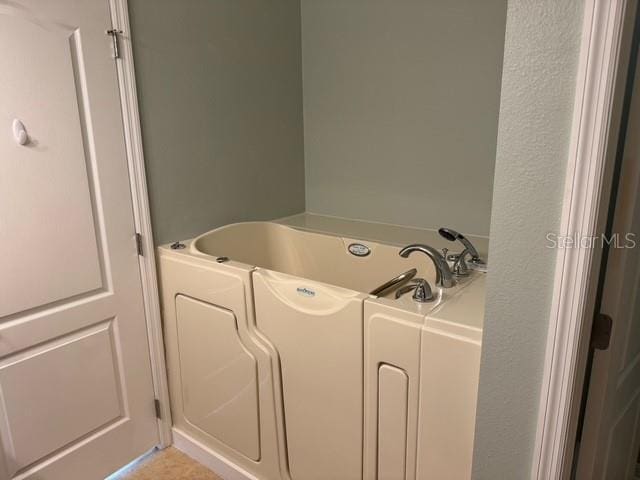 4077 River Bank Way, Punta Gorda, FL 33980 - bathroom with a bath