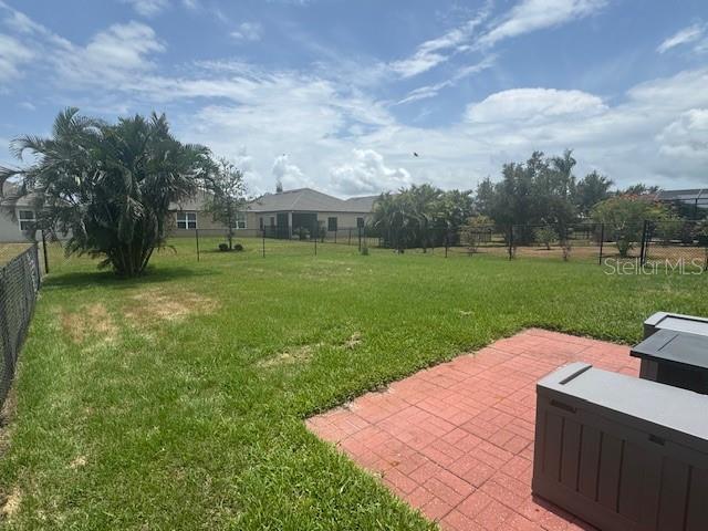4077 River Bank Way, Punta Gorda, FL 33980 - view of yard featuring a patio