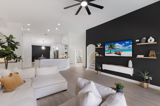 12015 Forest Park Cir, Bradenton, FL 34211 - living area featuring ceiling fan, stairway, light wood-type flooring, recessed lighting, and baseboards