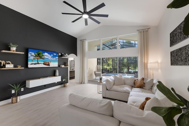 12015 Forest Park Cir, Bradenton, FL 34211 - living area featuring a ceiling fan, high vaulted ceiling, and wood finished floors