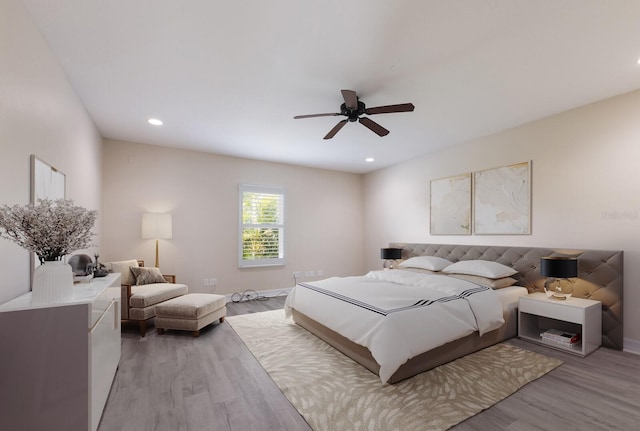 12015 Forest Park Cir, Bradenton, FL 34211 - bedroom with light wood-style flooring, recessed lighting, a ceiling fan, and baseboards