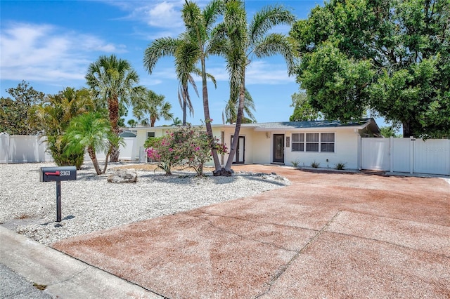 2363 Milford Cir, Sarasota, FL 34239 - ranch-style house with stucco siding