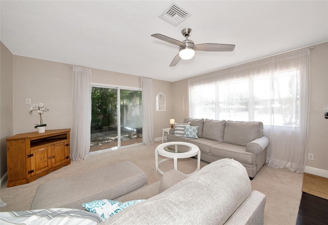 2363 Milford Cir, Sarasota, FL 34239 - living area featuring a ceiling fan and baseboards