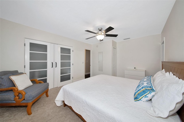 2363 Milford Cir, Sarasota, FL 34239 - bedroom featuring carpet and ceiling fan
