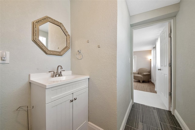 2363 Milford Cir, Sarasota, FL 34239 - bathroom with vanity and baseboards
