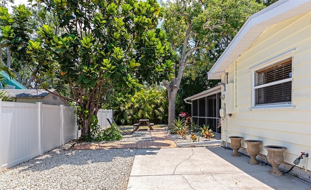 2363 Milford Cir, Sarasota, FL 34239 - view of patio / terrace featuring a sunroom