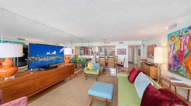988 Blvd Of The Arts Unit 1016, Sarasota, FL 34236 - living room with a textured ceiling