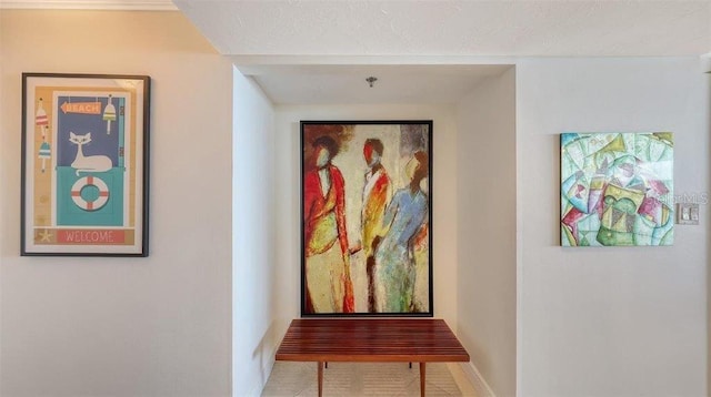 988 Blvd Of The Arts Unit 1016, Sarasota, FL 34236 - corridor with baseboards and tile patterned flooring