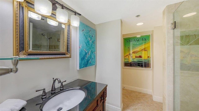 988 Blvd Of The Arts Unit 1016, Sarasota, FL 34236 - full bath featuring tile patterned floors, vanity, and a tile shower