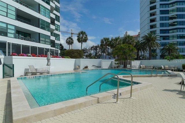 988 Blvd Of The Arts Unit 1016, Sarasota, FL 34236 - community pool featuring a patio area