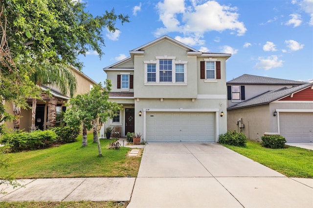 1234 Harbour Blue St, Ruskin, FL 33570 - traditional home with stucco siding, driveway, a front lawn, and an attached garage