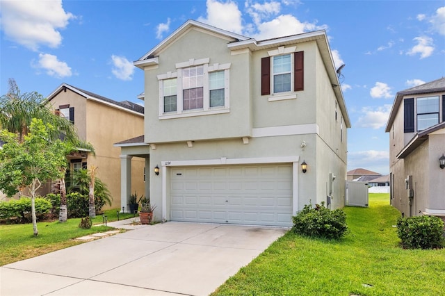 1234 Harbour Blue St, Ruskin, FL 33570 - view of front of house featuring an attached garage, stucco siding, a front yard, and concrete driveway