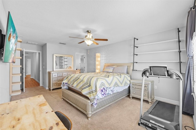 1234 Harbour Blue St, Ruskin, FL 33570 - bedroom with light colored carpet, a ceiling fan, and baseboards