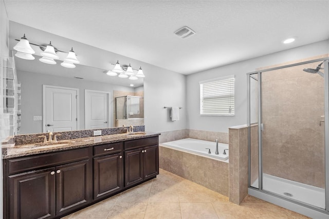 1234 Harbour Blue St, Ruskin, FL 33570 - bathroom with a bath, a shower stall, double vanity, and tile patterned flooring