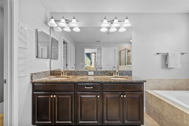 1234 Harbour Blue St, Ruskin, FL 33570 - bathroom featuring a stall shower, a garden tub, and double vanity