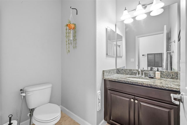 1234 Harbour Blue St, Ruskin, FL 33570 - bathroom featuring vanity, toilet, baseboards, and tile patterned flooring
