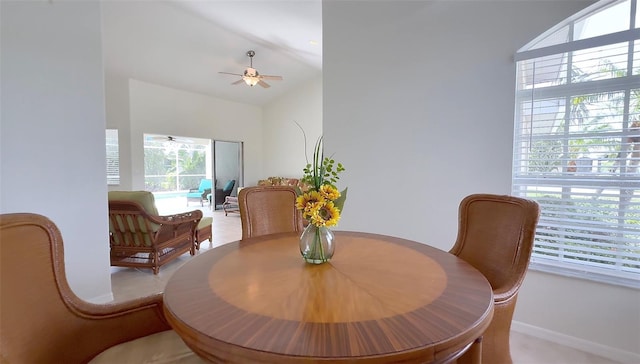 2199 Palm Ct, North Port, FL 34287 - dining space featuring lofted ceiling, ceiling fan, plenty of natural light, and baseboards