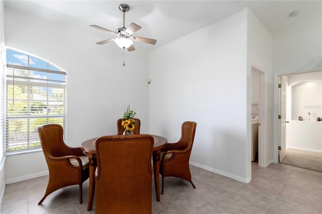 2199 Palm Ct, North Port, FL 34287 - dining room with a ceiling fan, healthy amount of natural light, baseboards, and light tile patterned flooring