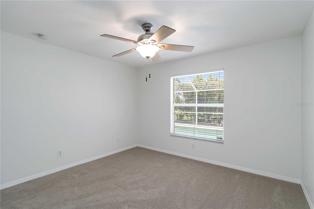 2199 Palm Ct, North Port, FL 34287 - carpeted spare room with a ceiling fan, baseboards, and a smoke detector