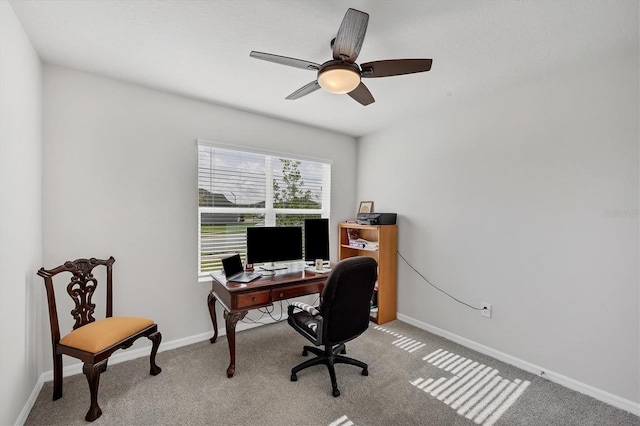 2105 Grand Flora Trl, Bradenton, FL 34208 - carpeted home office featuring baseboards and a ceiling fan