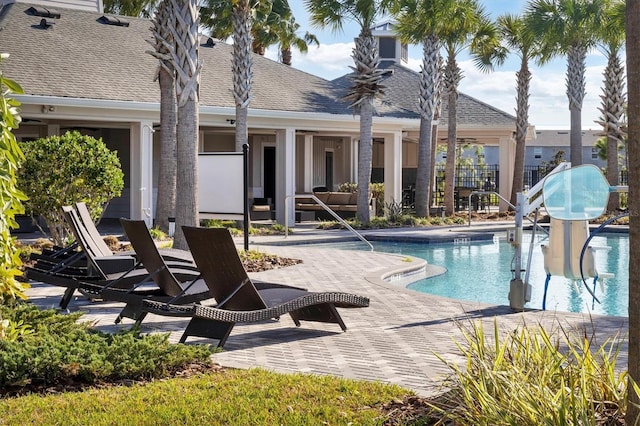 2105 Grand Flora Trl, Bradenton, FL 34208 - community pool with a patio