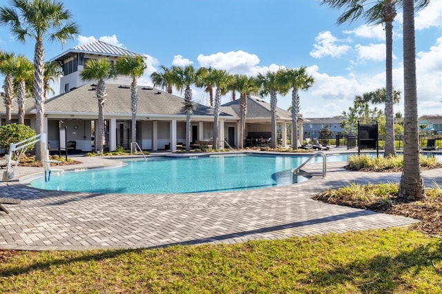 2105 Grand Flora Trl, Bradenton, FL 34208 - community pool with a patio area