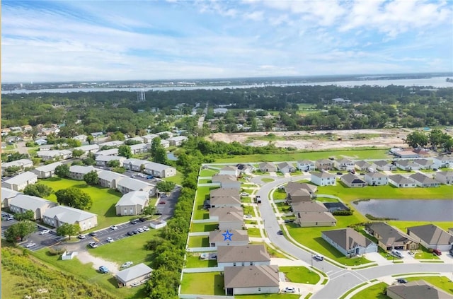 2105 Grand Flora Trl, Bradenton, FL 34208 - aerial perspective of suburban area with a nearby body of water