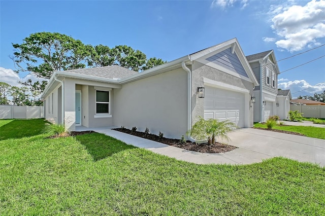 1643 35th St, Sarasota, FL 34234 - view of property exterior featuring stucco siding, an attached garage, and concrete driveway