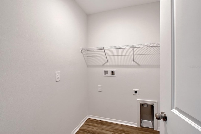 1643 35th St, Sarasota, FL 34234 - laundry room with hookup for a washing machine, electric dryer hookup, dark wood finished floors, and baseboards