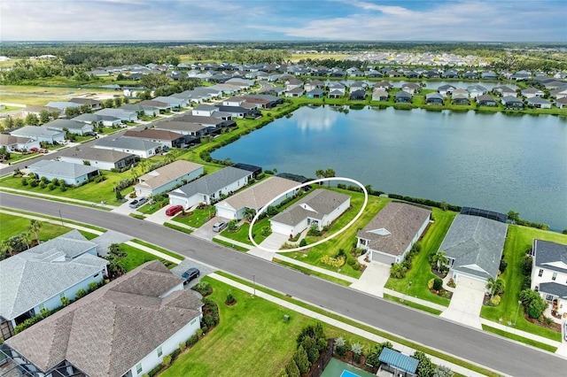 4625 Canoe Creek Ave, Parrish, FL 34219 - aerial perspective of suburban area with a large body of water
