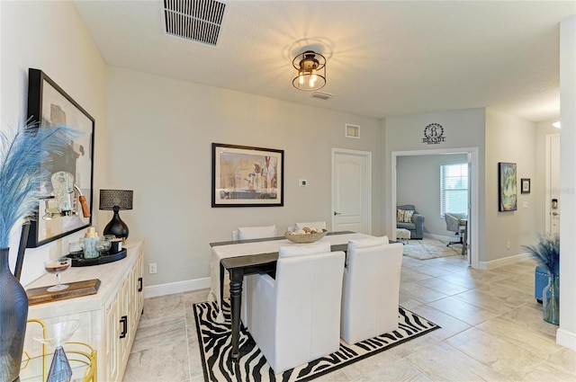 4625 Canoe Creek Ave, Parrish, FL 34219 - dining room with baseboards