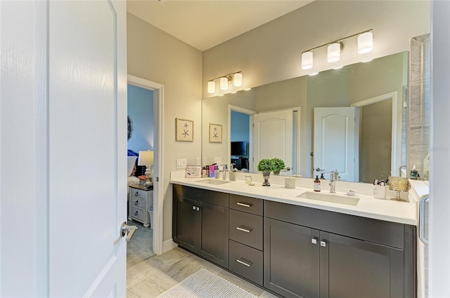 4625 Canoe Creek Ave, Parrish, FL 34219 - full bathroom featuring double vanity and ensuite bath