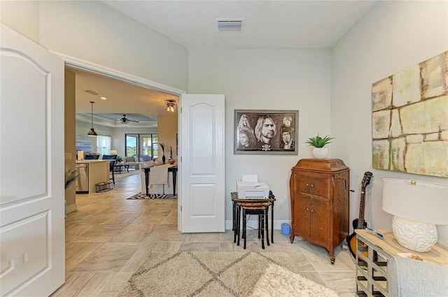 4625 Canoe Creek Ave, Parrish, FL 34219 - sitting room featuring ceiling fan and baseboards